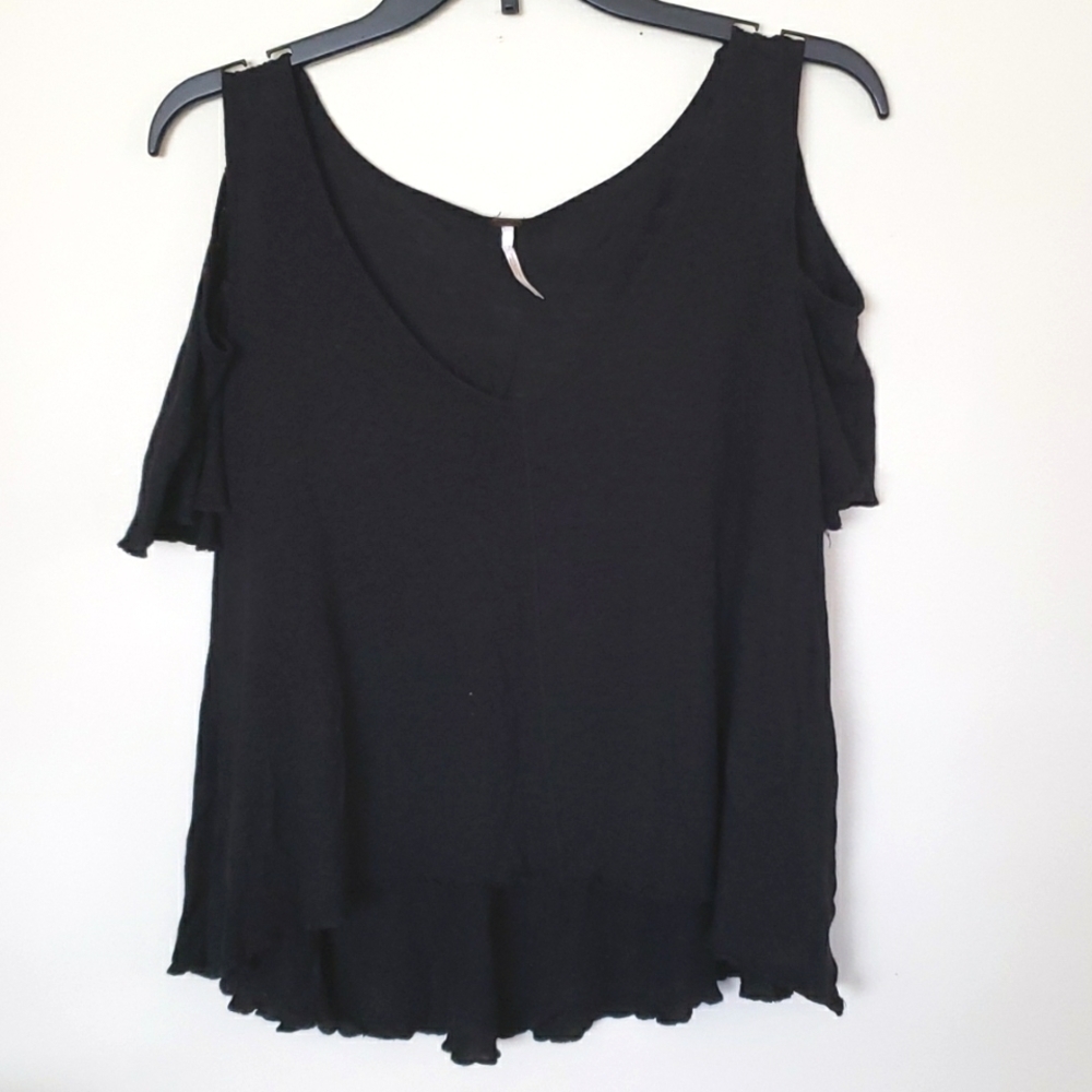 Free people high low cold shoulder flowy top.